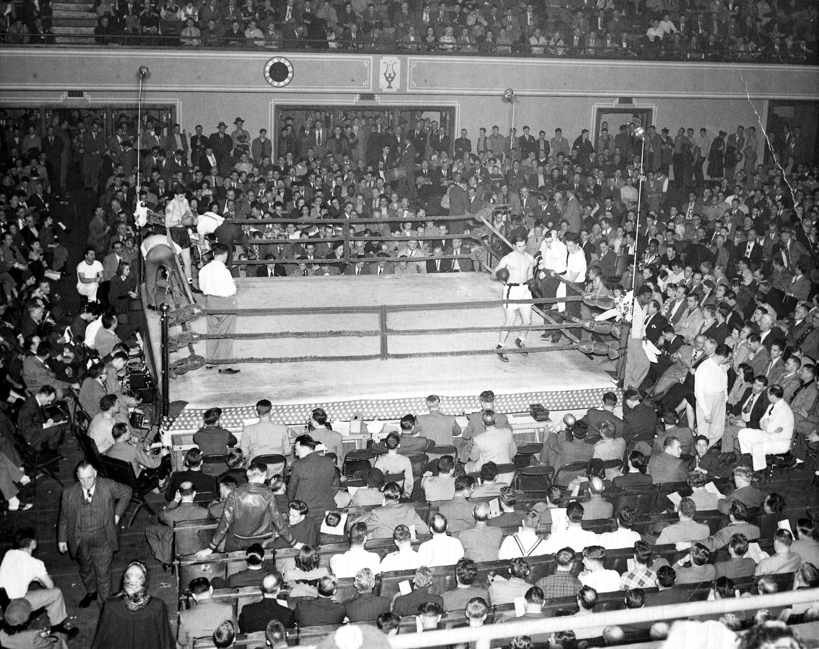 Boxing Ring with Large Crowd Boxing Ring with Large Crowd