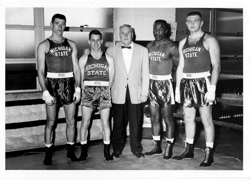 Coach Brotzmann and four boxers, date unknown Coach Brotzmann and four boxers, date unknown