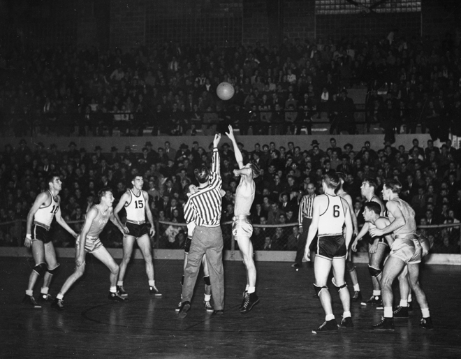 Tip off of a basketball game, 1940 Tip off of a basketball game, 1940